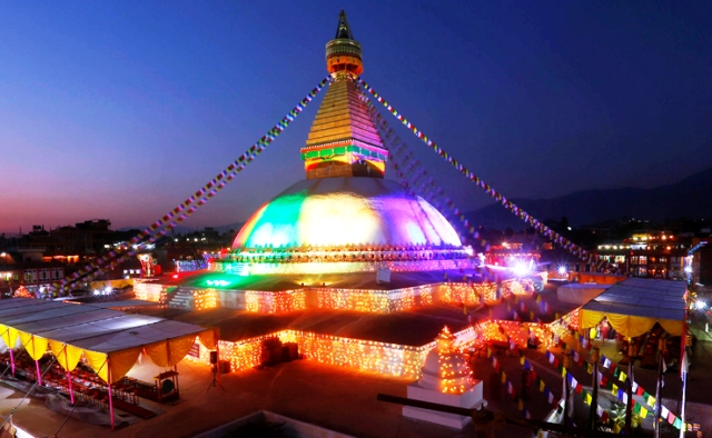 View of Boudhanath Stupa with electic lights. The stupa, which has sustained damage to its upper portion in the earthquake in 2015, will formally re-open on 22 November after reconstruction is completed. PHOTO/DINESH GOLE